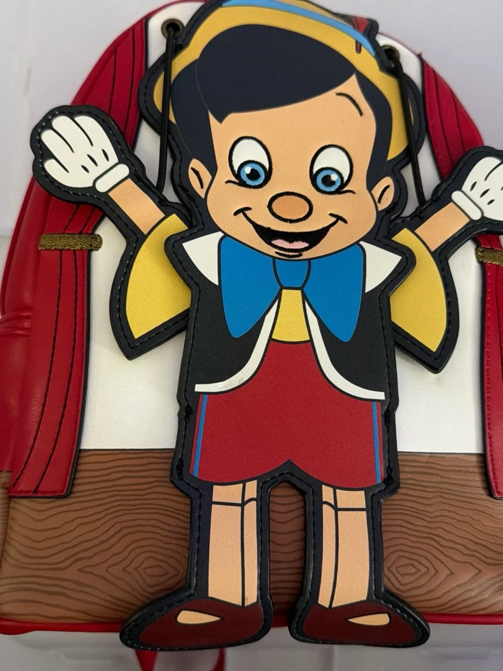 Pinocchio Character Backpack — Red, Blue, Yellow